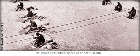 prisoners at robben island crushing stones